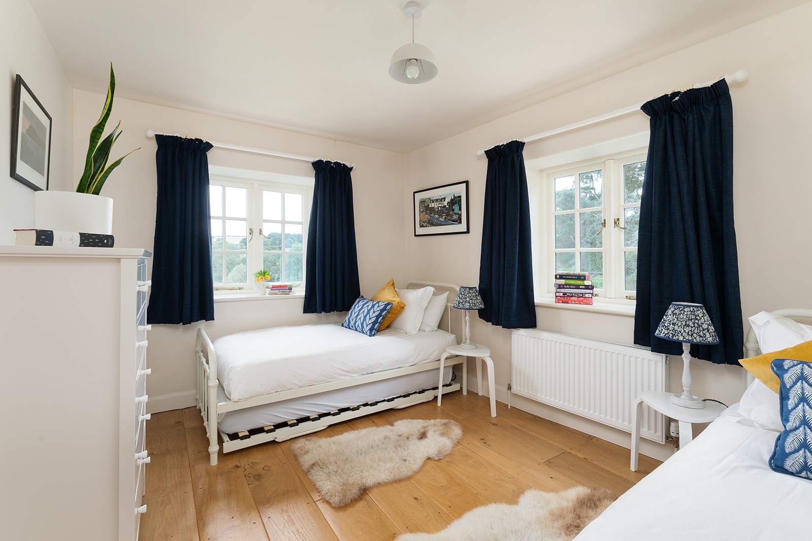 Bedroom 5 is home to these super twin beds, which both offer a three-foot truckle bed underneath. The perfect children's room.