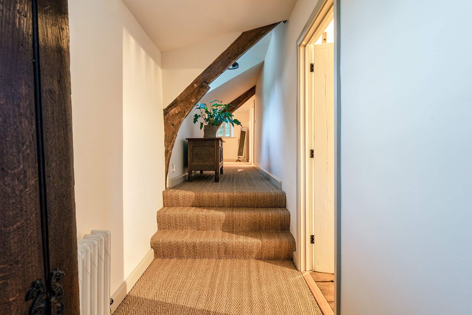 This beautiful landing links the first floor bedrooms perfectly. Please mind your head on the beams and down the steps.