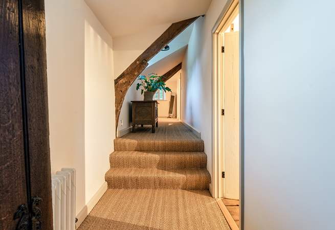 This beautiful landing links the first floor bedrooms perfectly. Please mind your head on the beams and down the steps.