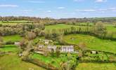 An aerial view of the Trafalgar Barton grounds. The Dolls House is nestled in neatly behind The Coach House. - Thumbnail Image