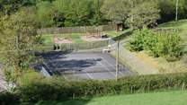 The public tennis courts are at your disposal, just located a close walk away.
