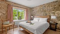 The king-size bed awaits, offering a good nights sleep after a day of adventure and action.