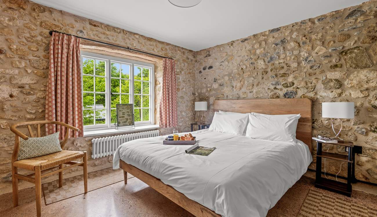 The king-size bed awaits, offering a good nights sleep after a day of adventure and action.