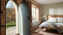 Step inside beautiful The Dolls House, straight into the king-size bedroom.