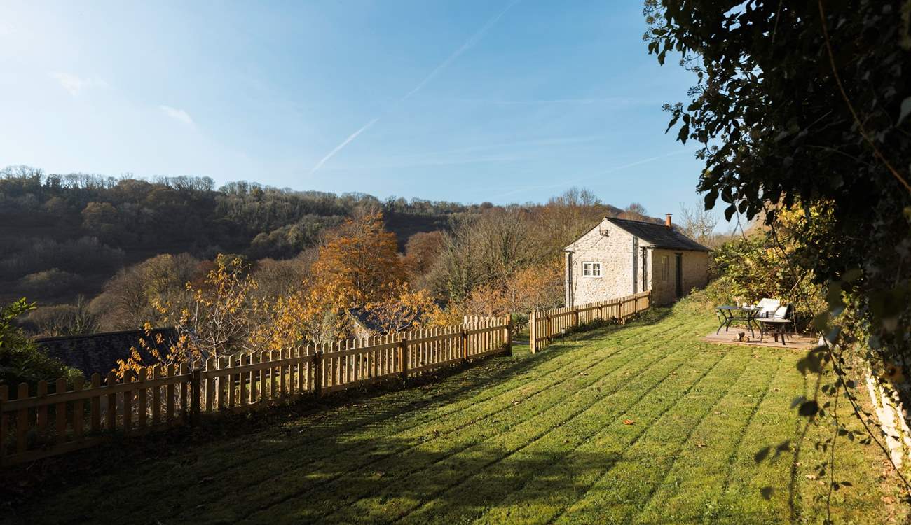 The sprawling fully enclosed lawn is perfect for letting your four-legged friends let off steam.