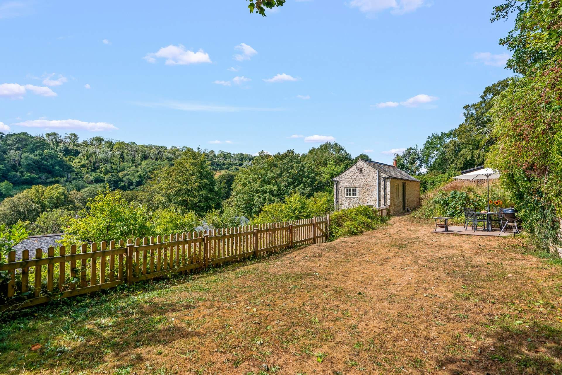 The fully enclosed lawn is perfect for letting your four-legged friends let off steam.