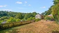 The fully enclosed lawn is perfect for letting your four-legged friends let off steam.