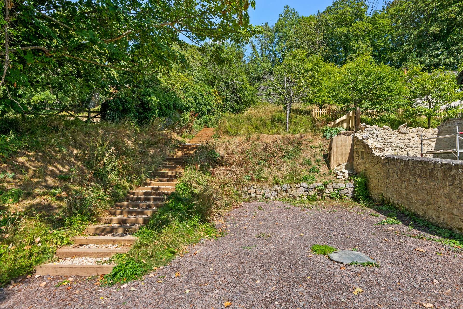 Your parking area with steps leading up to The Dolls House.