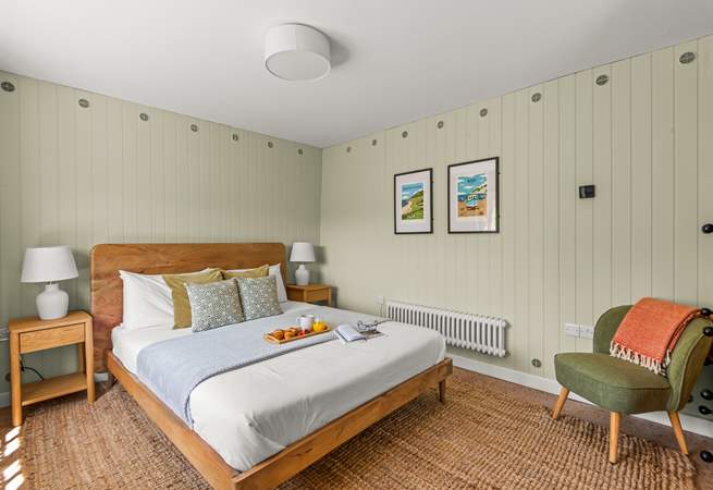 On entering, you will be greeted by the stylish king-size bedroom.
