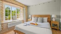 The king-size bed awaits, offering a good nights sleep after a day of adventure and action.