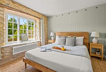 The king-size bed awaits, offering a good nights sleep after a day of adventure and action.