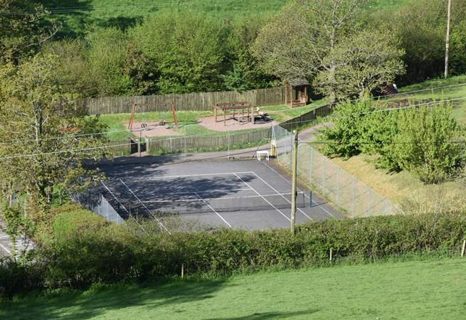 You can access a public tennis court just below The Coach House.