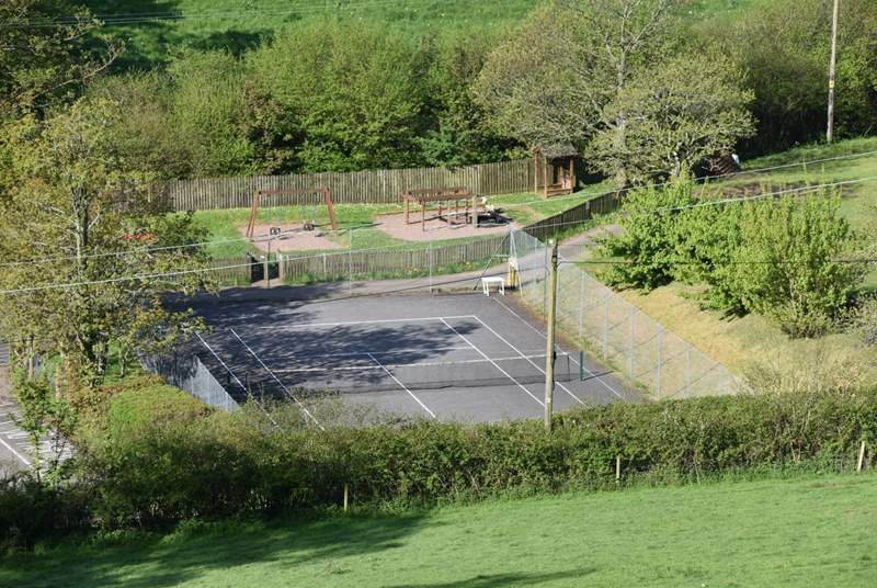 You can access a public tennis court just below The Coach House.