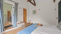 Peeking out on the landing from Bedroom 3. Please take care on the step when entering and exiting the bedroom.