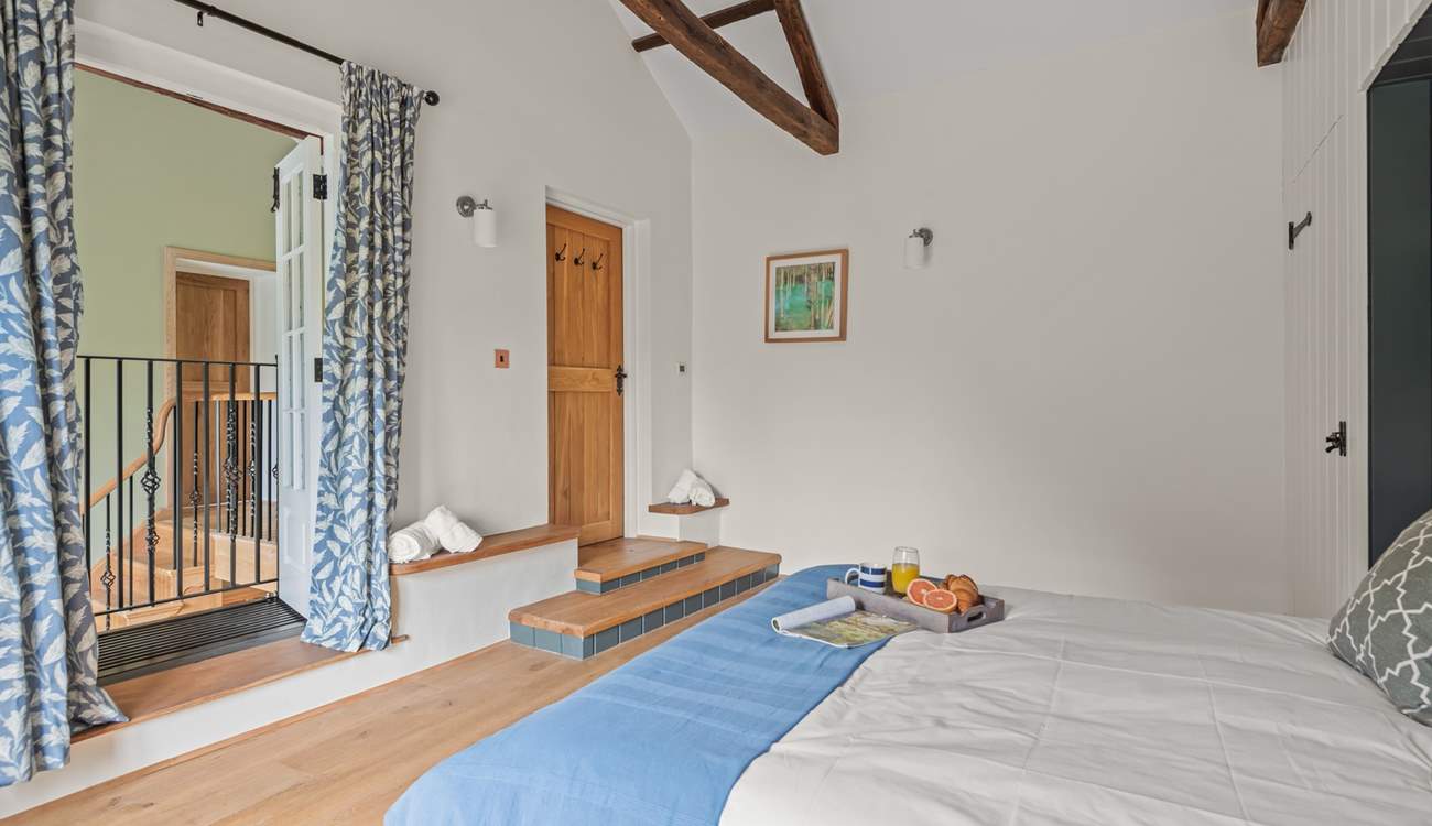 Peeking out on the landing from Bedroom 3. Please take care on the step when entering and exiting the bedroom.