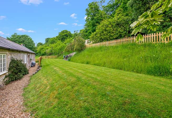 Step out of the living-area into your fully enclosed garden area.