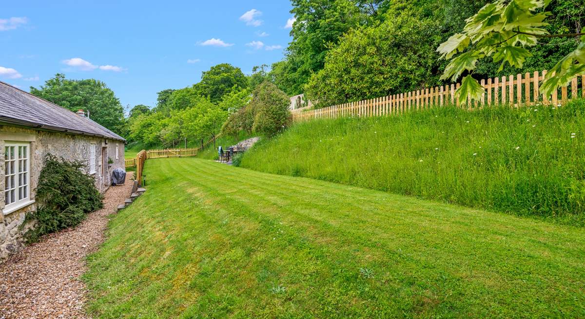 Step out of the living-area into your fully enclosed garden area.