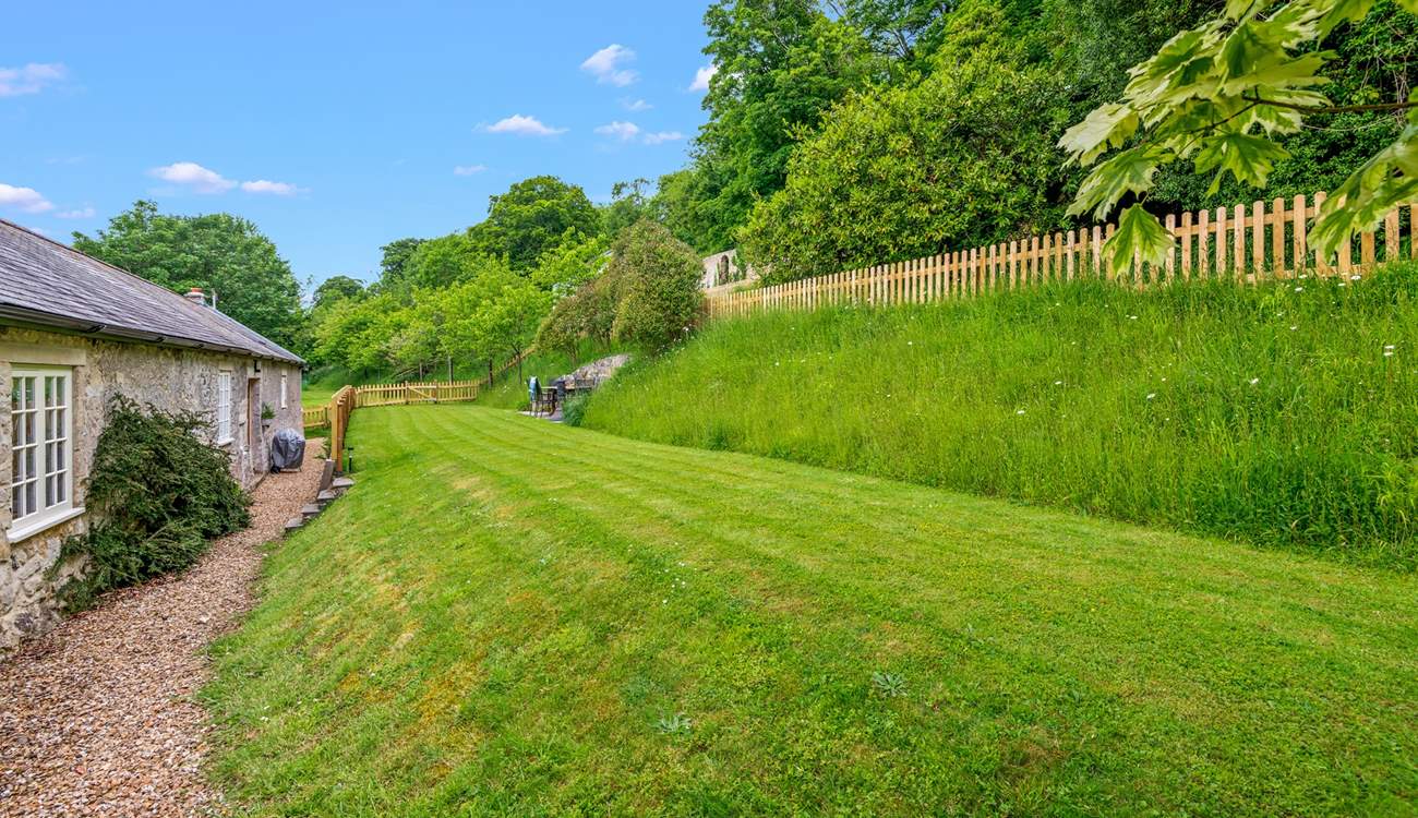 Step out of the living-area into your fully enclosed garden area.