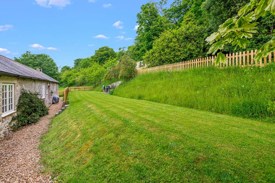 Step out of the living-area into your fully enclosed garden area.