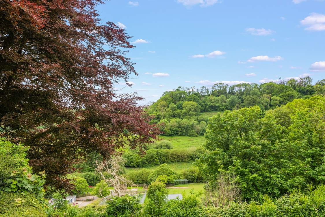 You can access a public tennis court just below The Coach House.