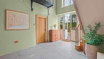 Looking back at the front door, with Bedroom 1 to the left.