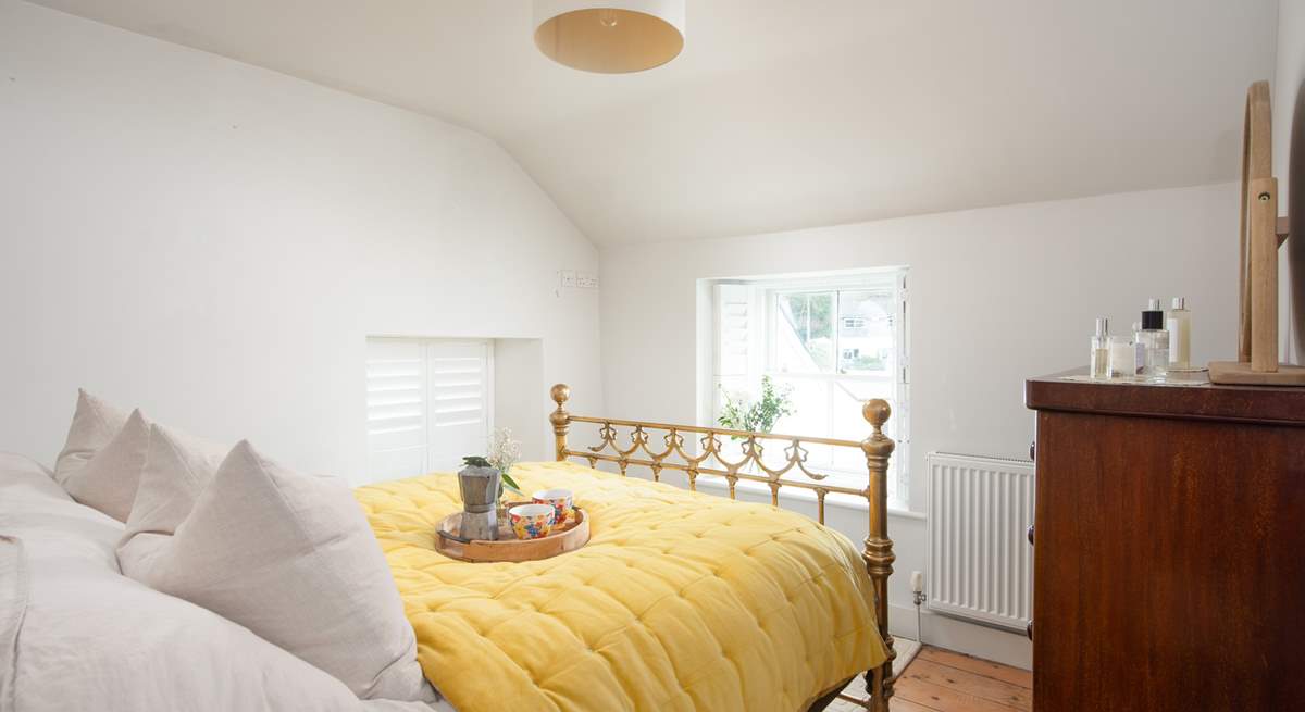 Bedroom 1 features this magnificent brass bed.