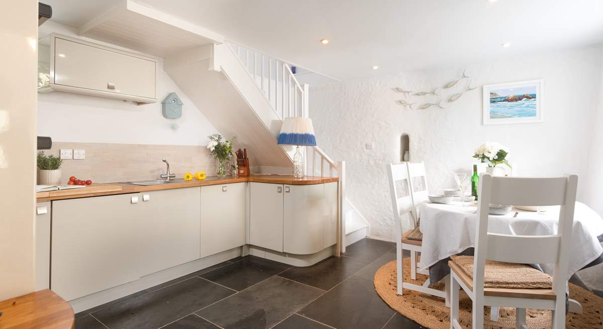 Grand flagstone flooring, mined from the local quarry. Please note the lower ceiling height to the right side of the kitchen counter.