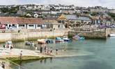 Porthleven is a short drive away and is a quintessential Cornish fishing village, with a shipyard market, gorgeous eateries, clock tower and pier. - Thumbnail Image