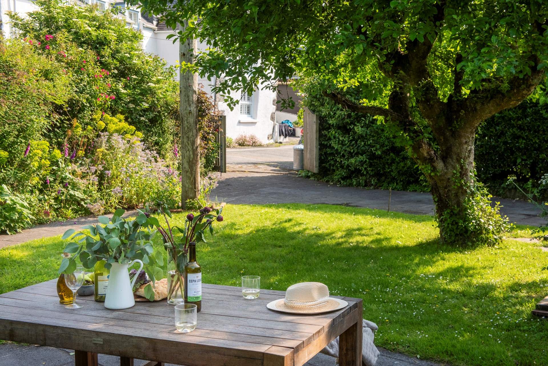 The garden is parallel to the cottage, and is sheltered from the elements in the cooler months, and a sun trap in the summertime.