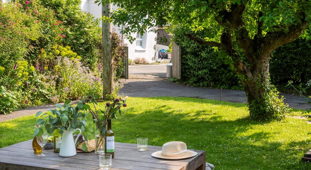 The garden is parallel to the cottage, and is sheltered from the elements in the cooler months, and a sun trap in the summertime.