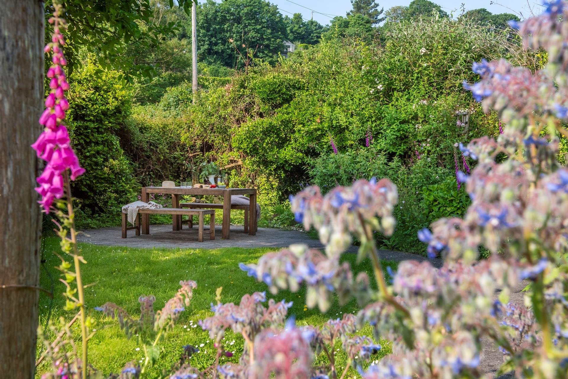 The stunning private garden is an oasis in the summertime.