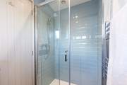 The en suite shower-room to bedroom 3.