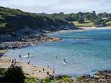 Tatams beach in Portscatho with Porthcurnick beach in the distance.