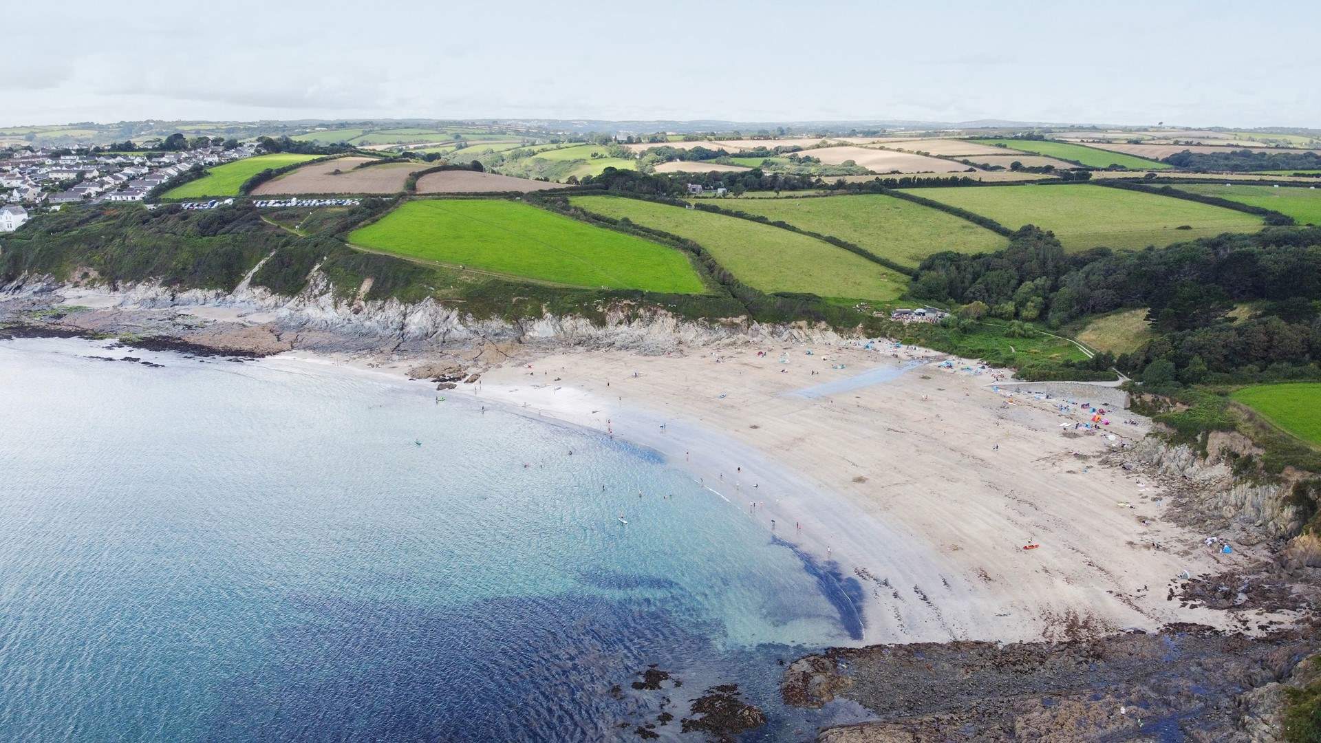 A bird's eye view of Porthcurnick beach, which is within walking distance.