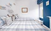 Calming blue hues in the twin room.  - Thumbnail Image