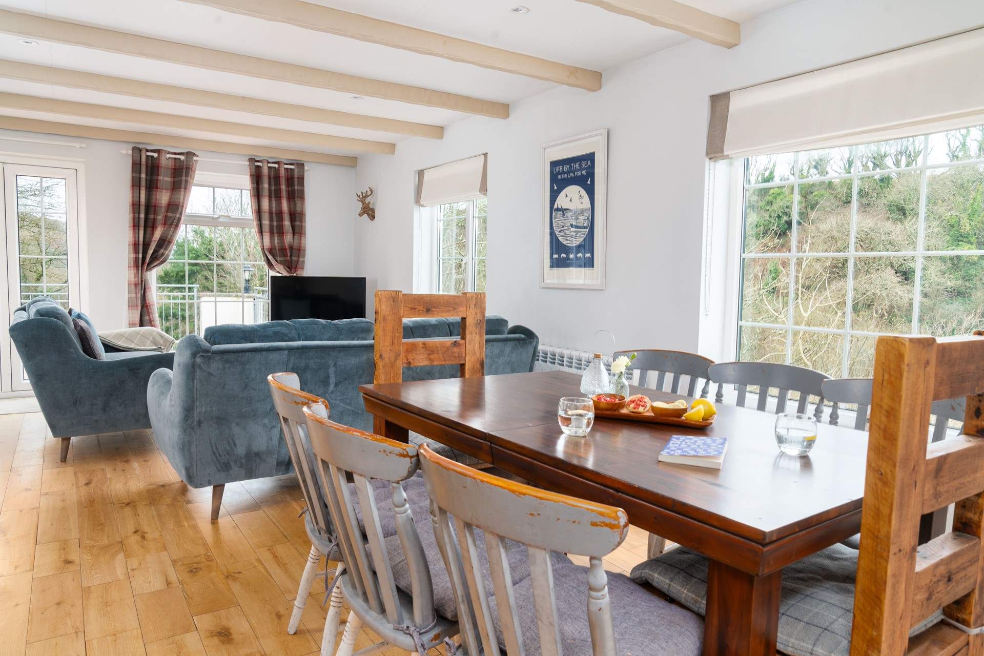 Spacious open plan design with gorgeous woodland and sea views. 