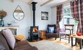  A cosy corner of the spacious open plan living area. Ideal for a holiday throughout the year.  - Thumbnail Image