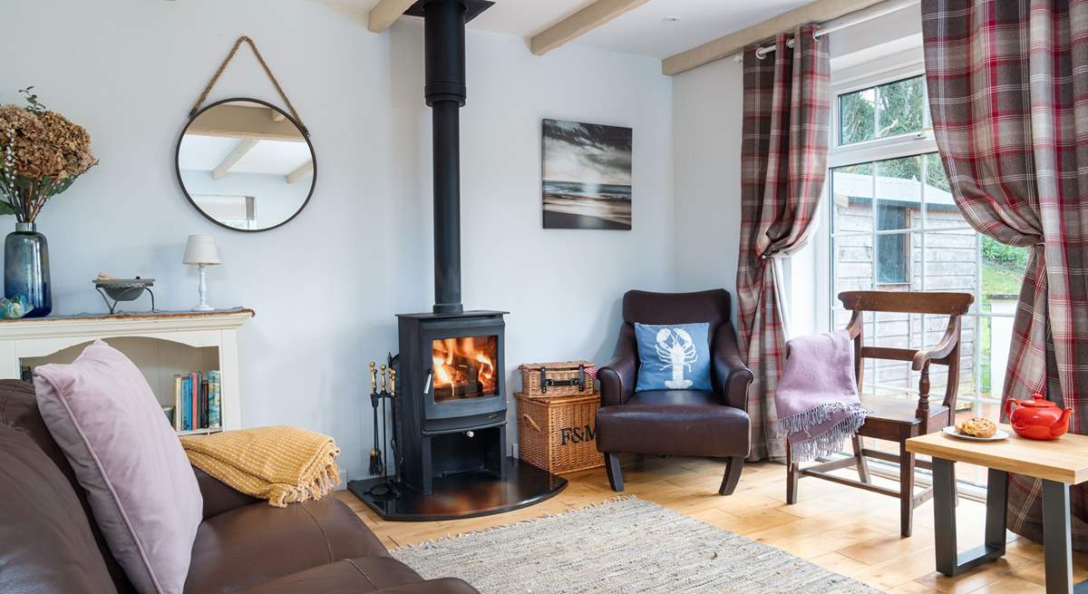  A cosy corner of the spacious open plan living area. Ideal for a holiday throughout the year. 