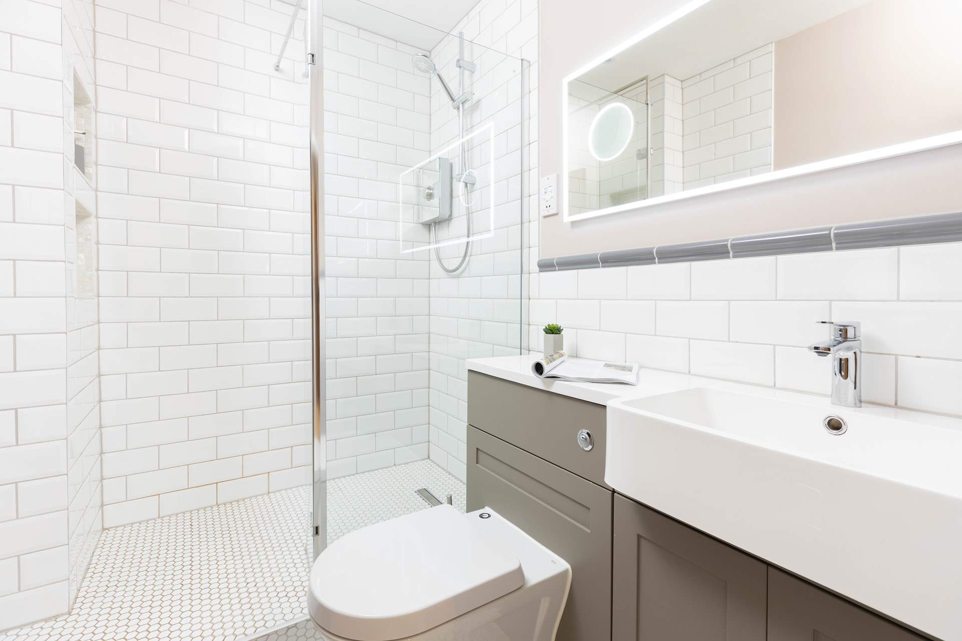 The fabulous shower-room has under-floor heating (please note there is one step up into the shower). 