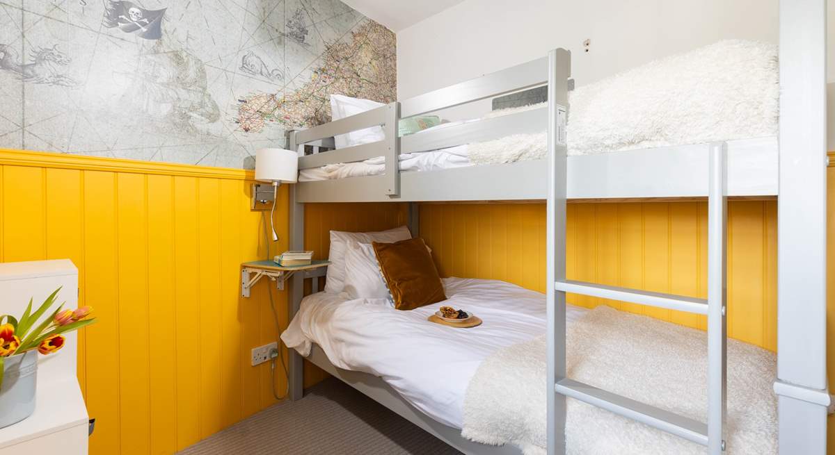 The cosy bunk room is perfect for children. 