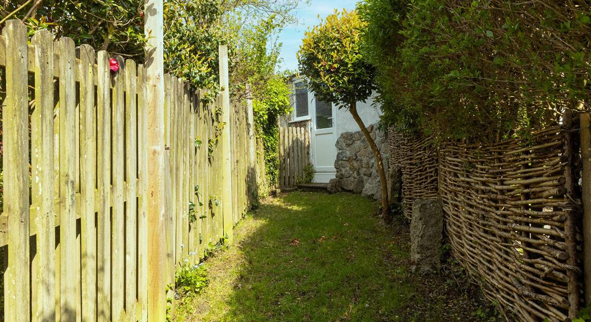 The little lawn is perfect to kick a ball about in. 