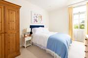 The double bedroom on the ground floor has its own en suite shower-room.