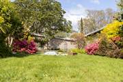 Enjoy a good book in the beautiful gardens.