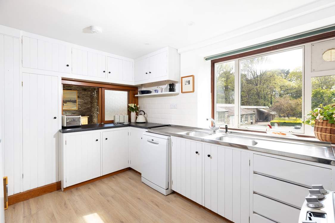 The little kitchen is well-equipped for your holiday needs.