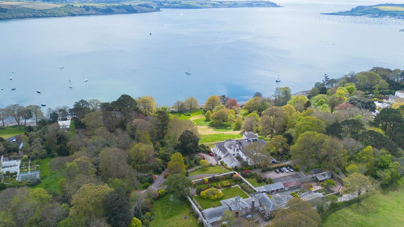 Welcome to The Clock House, it is the property at the bottom of the photo with the walled garden.
