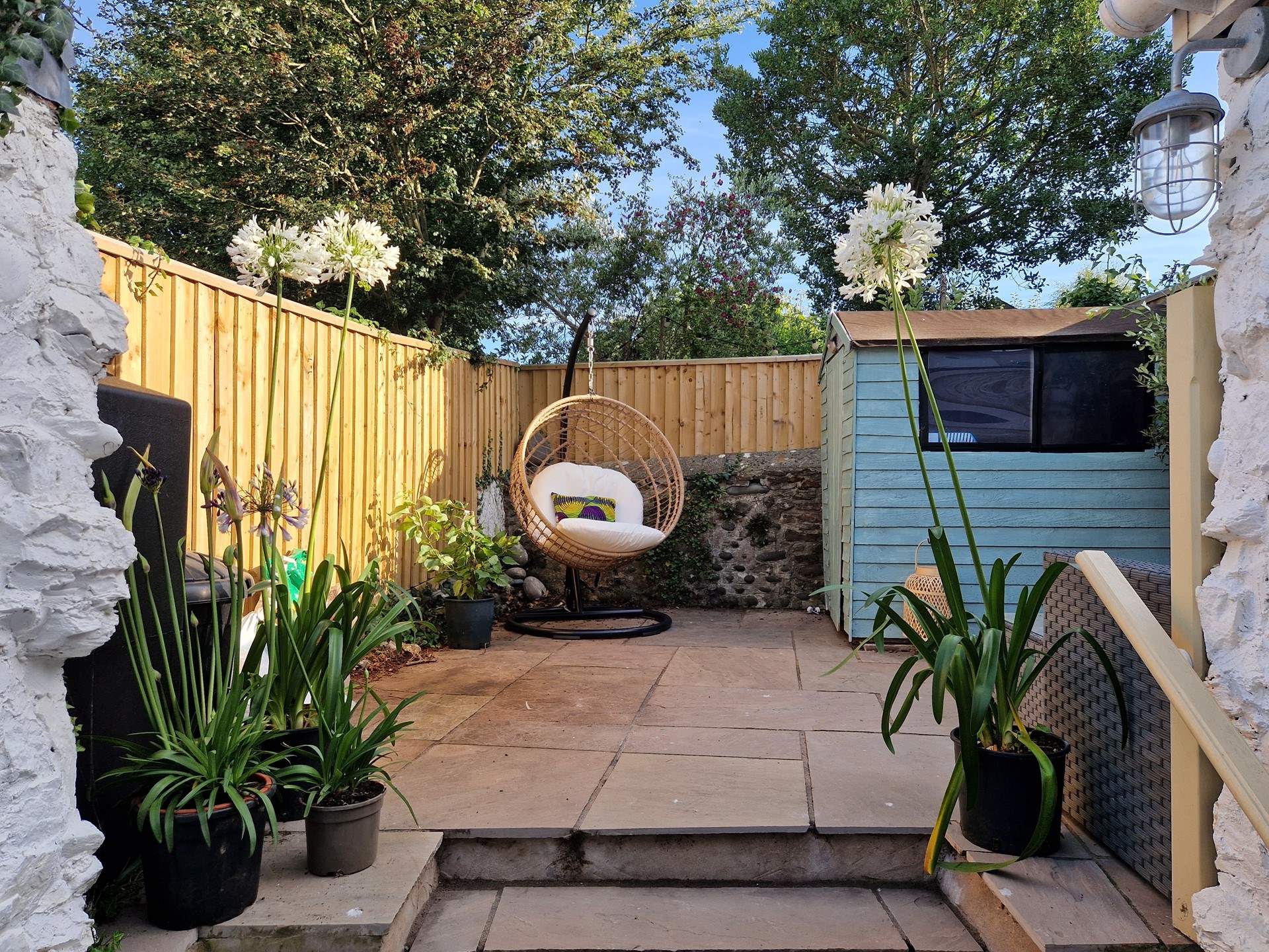 The cutest courtyard garden is the perfect backdrop. 