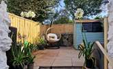 The cutest courtyard garden is the perfect backdrop.  - Thumbnail Image