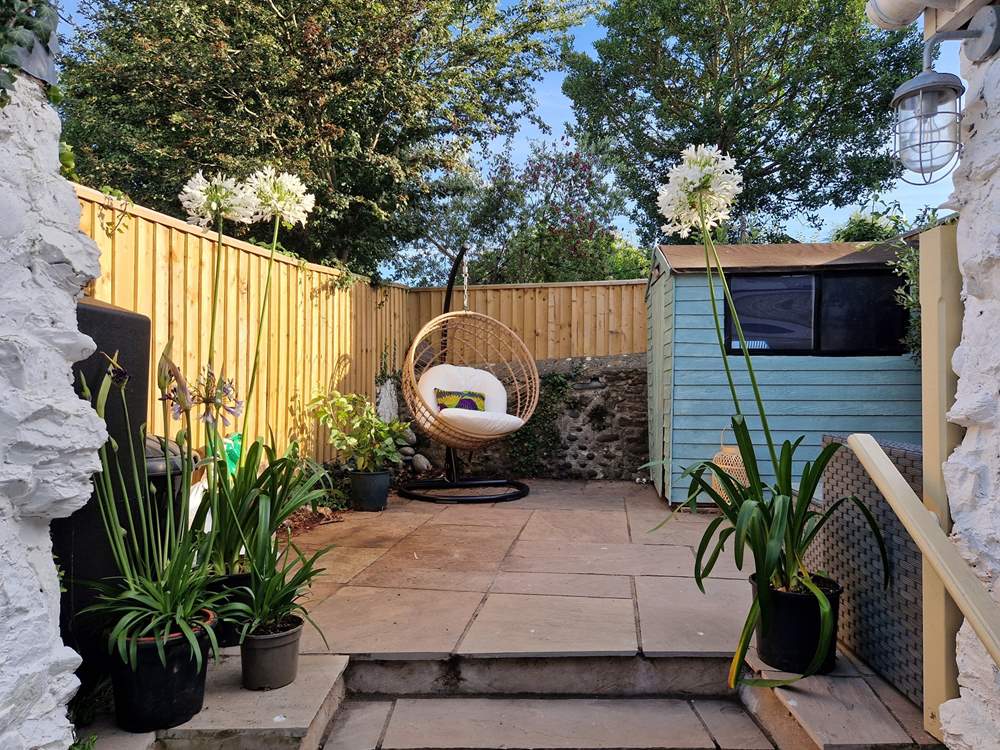 The cutest courtyard garden is the perfect backdrop.