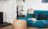 This stylish low slung sofa creates a lovely chill-out nook don't worry the other large velvet sofa is a normal height. - Thumbnail Image