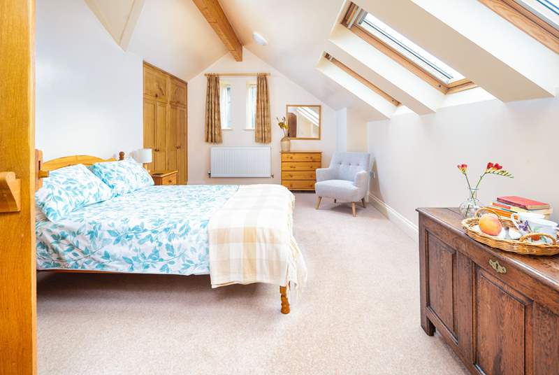 What a lovely room, this bedroom has its own en suite shower-room.